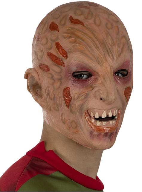 Máscara de látex de Freddy Krueger con rostro quemado, sonrisa con dientes blancos, vista 3/4