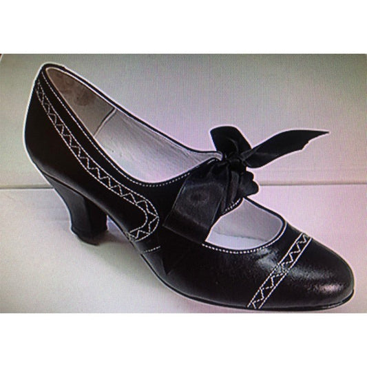 Zapato de mujer de tacón alto negro con moño frontal y costuras decorativas